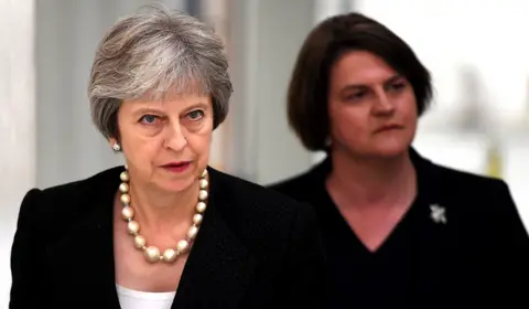 Getty Images Theresa May and the DUP's Arlene Foster