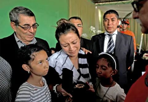 Reuters Family members of Juan Fernando Galindo