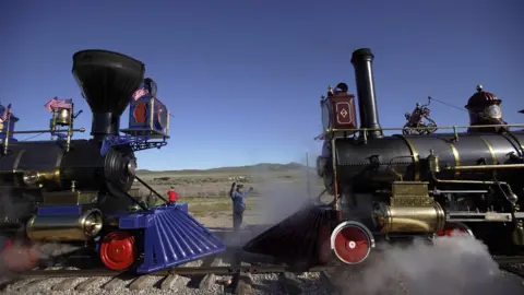 Getty Images Two steam trains meet on the railway line