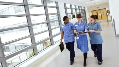 Science Photo Library Nurses in a UK hospital