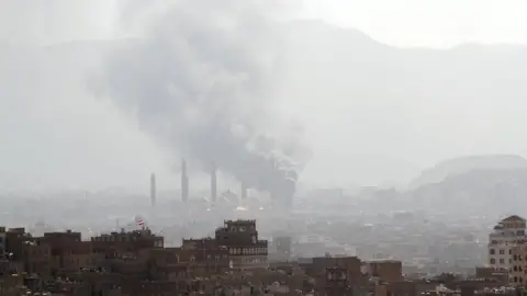 Reuters Smoke rises during the battle between former Yemeni President Ali Abdullah Saleh's supporters and the Houthi fighters in Sanaa, Yemen December 2, 2017