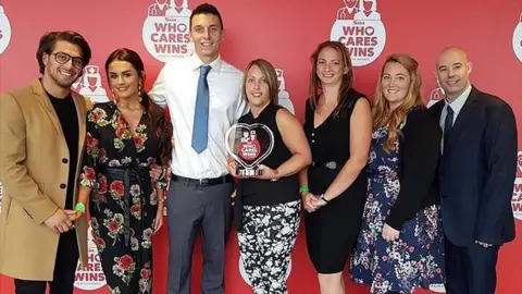 Phil Smith Storm Warner with paramedics