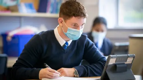 PA Media pupil wearing a mask