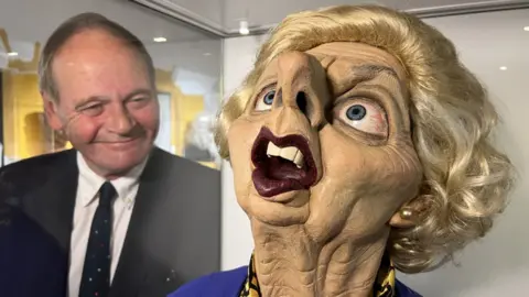 Steve Hubbard/BBC John Lloyd with Margaret Thatcher puppet