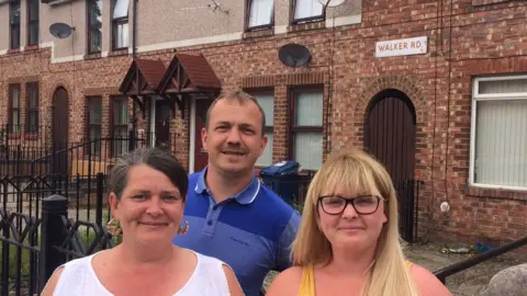 BBC (Left to right) Linda Parkinson, Anthony Kerr and Cheryl Shearer on Walker Road