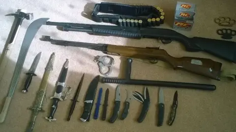 West Midlands Police Some of the weapons found at the two properties and not in Vehvilainen's possession