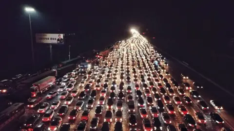 Getty Images Traffic jam on night highway