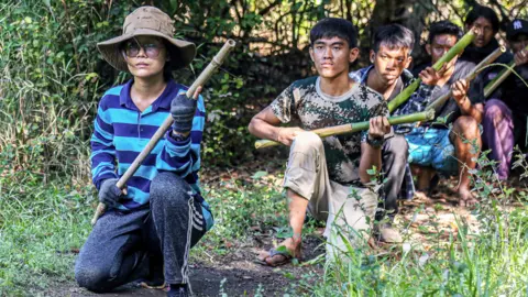 Getty Images Members of the People's Defence Force (PDF) training in the forests of the Kayin State, November 2021