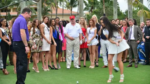 Getty Images Mr Trump attends a golf course opening day at the Doral