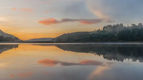 Martyn Jenkins First light over a mirror like Llwn-on Reservoir, Merthyr Tydfil