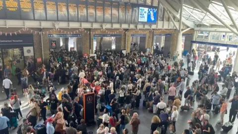 Passengers at King's Cross station