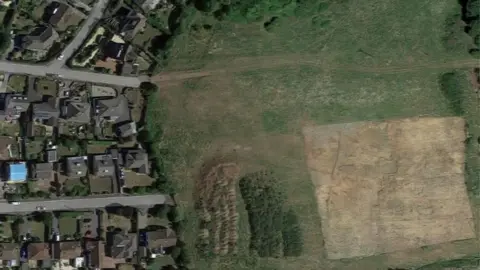 Google Google view of area off Wentwood Drive where the forest preschool will be created.