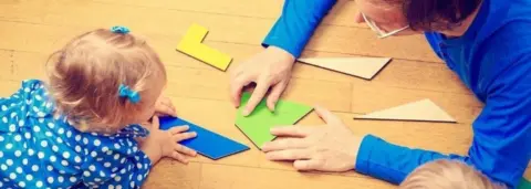 Getty Images Child and father playing