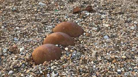 The Sir Antony Gormley sculptures at Aldeburgh beach