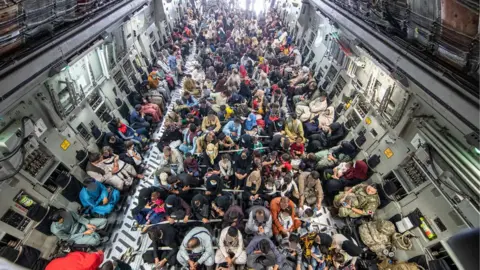 MOD/PA Wire The MoD has released a picture of people on an evacuation flight out of Kabul