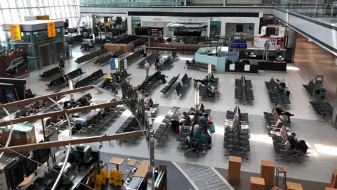 Getty Images The departure lounge at Heathrow's Terminal 5 is almost empty