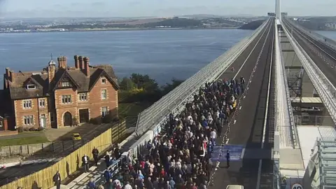 Traffic Scotland Walkers begin their journey across the new Queensferry Crossing