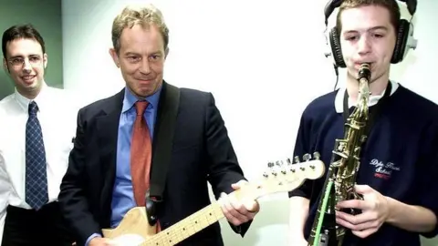 PA Tony Blair with guitar