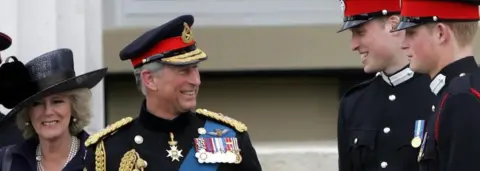 PA Prince of Wales and the Duchess of Cornwall with Prince William and Prince Harry