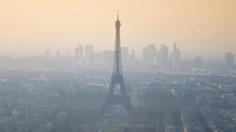 Getty Images The Eiffel Tower in the smog: Paris