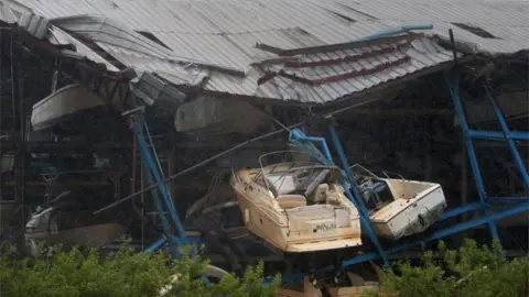 Reuters A boat rack storage facility lays destroyed after Hurricane Irma blew though Hollywood, Florida