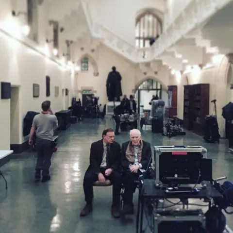 Angharad Elen Mark Lewis Jones and Tedi Millward on the set of The Crown in Aberystwyth