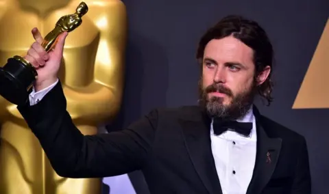 AFP/Getty Images Casey Affleck pictured with his 2017 Oscar for best actor