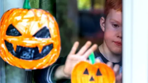 Getty Images pumpkin in window