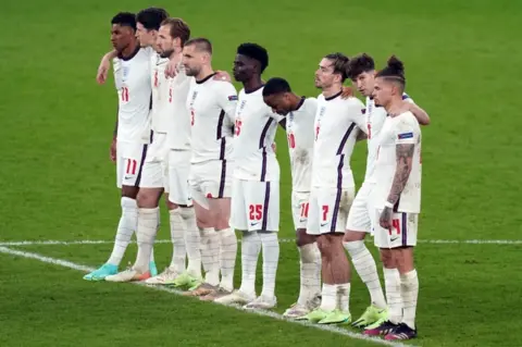 PA Media England's football team after the penalties