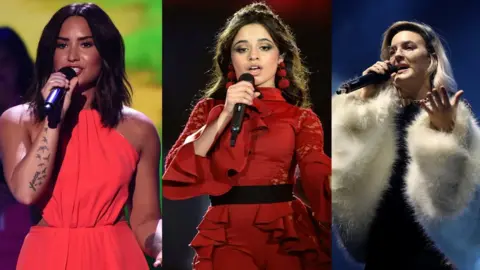 Getty Images Demi Lovato, Camila Cabello and Anne-Marie