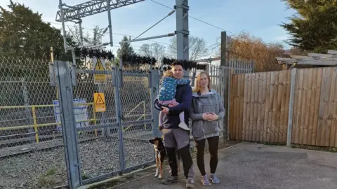 David White David White and family by entrance to railway section near their home