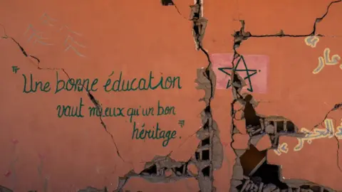 Carl Court/Getty Images A cracked wall, 13 September