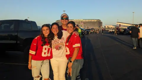 Lily Sologuren (far right) and family