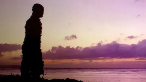@gettinguptostuff instagram The silhouette of Wireman against a sunset