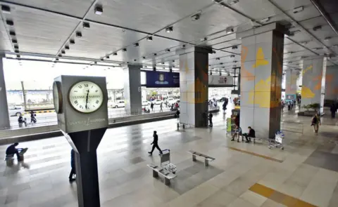 Getty Images Low footfall seen at Indira Gandhi International (IGI) Airport amid rising coronavirus fear on March 16, 2020 in New Delhi, India.