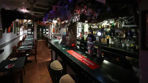 Warren Little/Getty Images A deserted Spanish Tapas restaurant in Camberley, in Surrey.