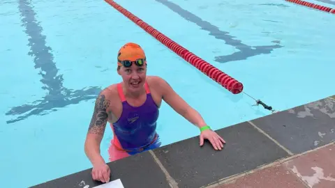 Handout Michelle Lane in the swimming pool