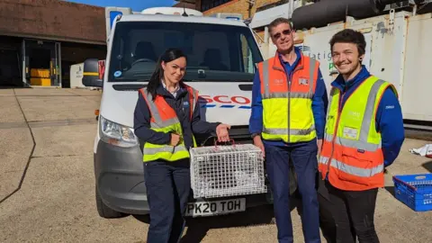 RSPCA RSPCA Inspector Caroline Richardson holding the otter pup she can previously pulled from within a Tesco delivery van's engine