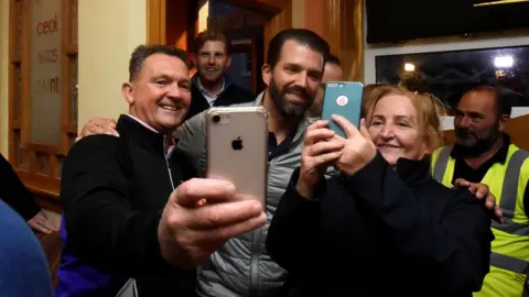 Reuters US President Donald Trump's sons Eric and Donald Trump Jr visit a local pub in Doonbeg