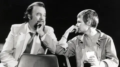 National Theatre Sir Peter Hall and Dame Judi Dench during rehearsals for The Importance of Being Earnest (1982)