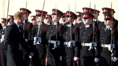 Reuters Prince Harry inspects the officer cadets at the Sovereign's Parade