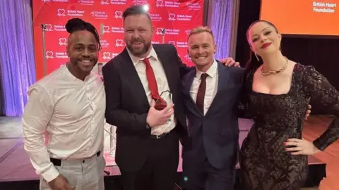 British Heart Foundation Dan Howells with S Club members Bradley McIntosh, Jon Lee and Tina Barrett at the BHF Heart Hero Awards