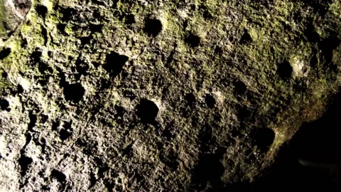 George Nash Cupmarked upper surface of the capstone, taken during darkness hours