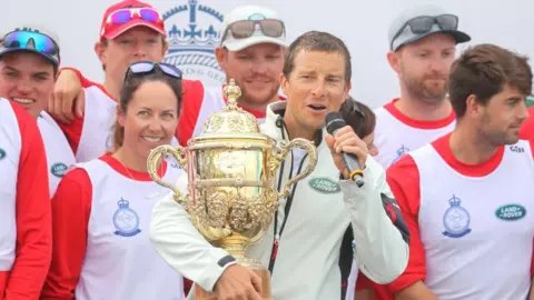 Getty Images Bear Grylls and his team being awarded the King's Cup