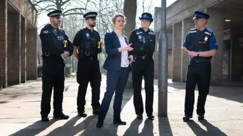 PA Media Yvette Cooper meeting police and community support officers in Milton Keynes