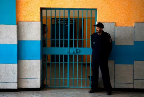 AFP A prison warden stands guard at the Oukacha prison in Casablanca on February 2, 2018.