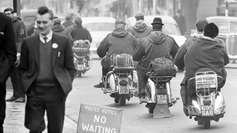 Mirrorpix Mods on scooters, 1964