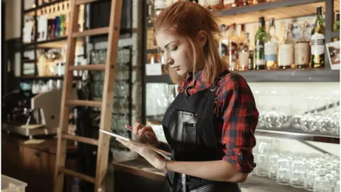 Getty Images Manager behind a bar