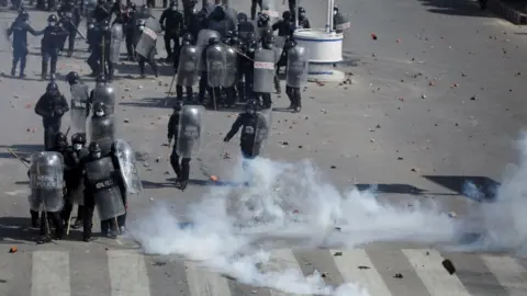 Reuters Riot police