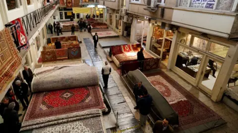 AFP Carpet sellers in Tehran.